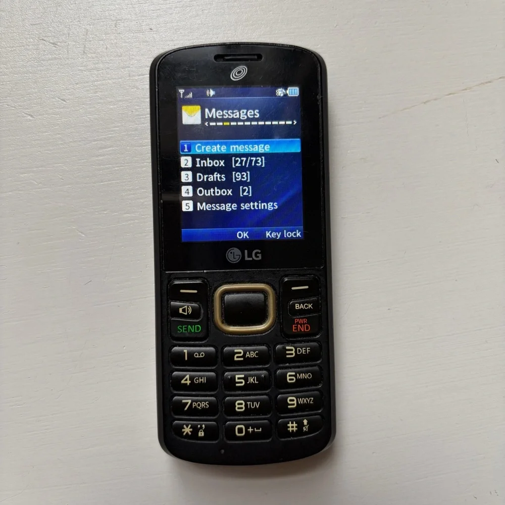 LG Tracfone 328BG Black Candybar Prepaid Cell Phone with Wall Charger